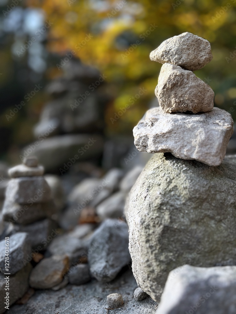 A carefully stacked stone cairn in a peaceful forest setting, symbolizing balance, mindfulness, and meditation. A perfect nature-inspired image for wellness, travel, and outdoor adventure themes A carefully stacked stone cairn in a peaceful forest setting, symbolizing balance, mindfulness, and meditation. A perfect nature-inspired image for wellness, travel, and outdoor adventure themes