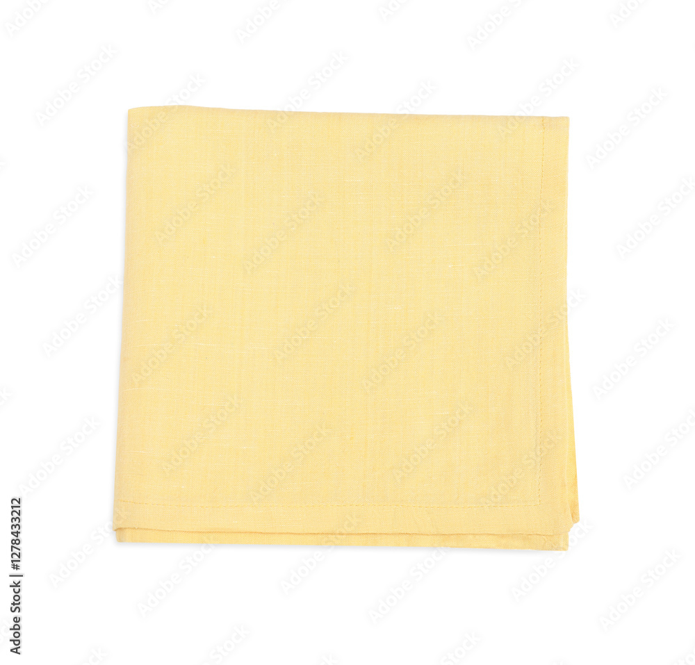 One light yellow folded napkin isolated on white, top view One light yellow folded napkin isolated on white, top view