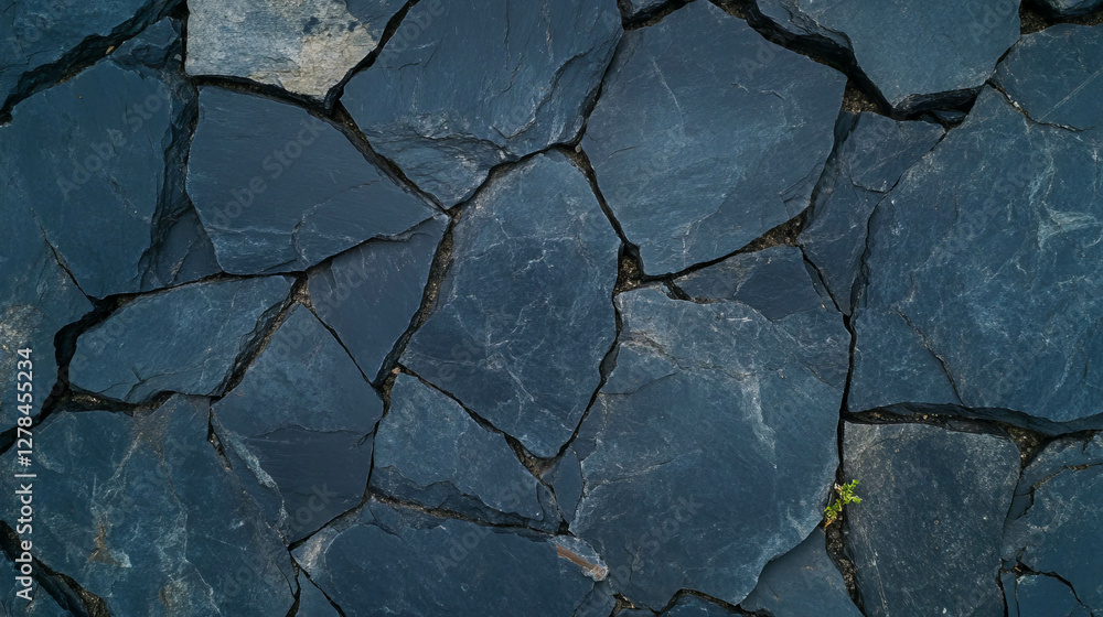 Obraz premium Coarse cracked black slate texture for background and design