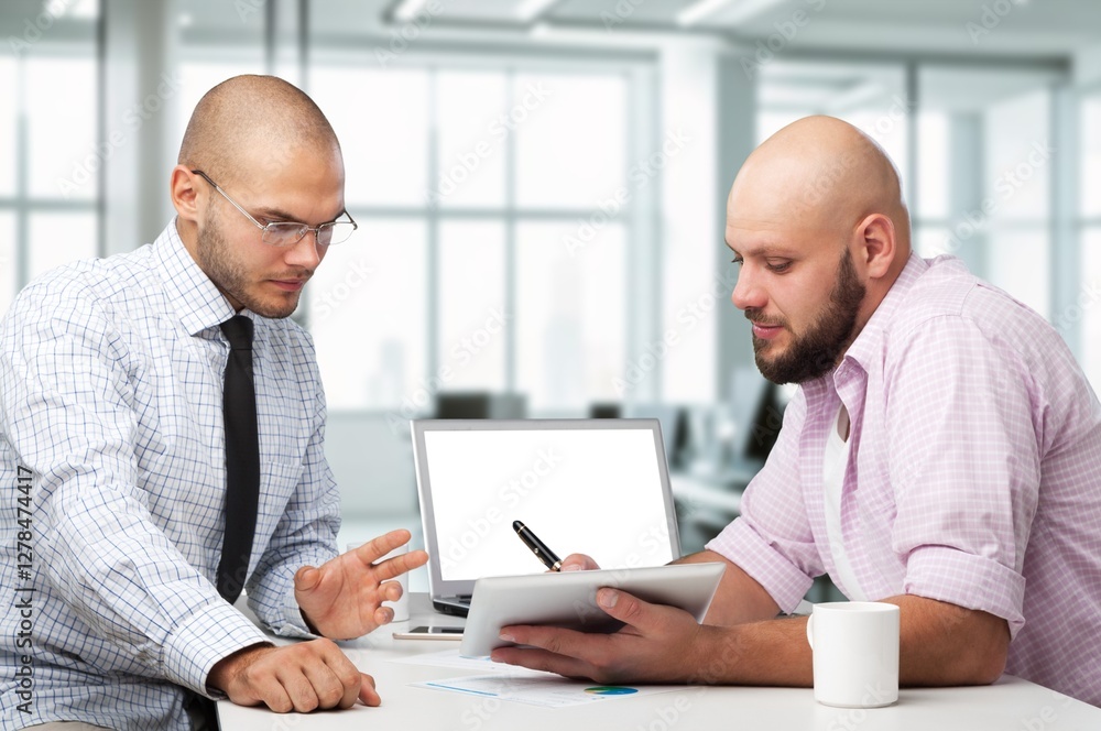 Fototapeta premium Inspired young entrepreneur talking to business partner
