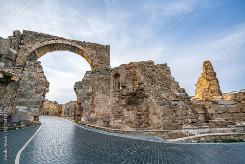 The Scenic view of  Vespasian Arch (originally the Vespasian Gate) is a very interesting landmark of antic Side, Antalya. The height of the arch reaches 13 meters, with the width of 7 meters. 