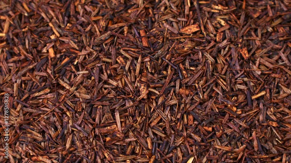 Rooibos tea dried leaves texture circle rotation close up Rooibos tea dried leaves texture circle rotation close up