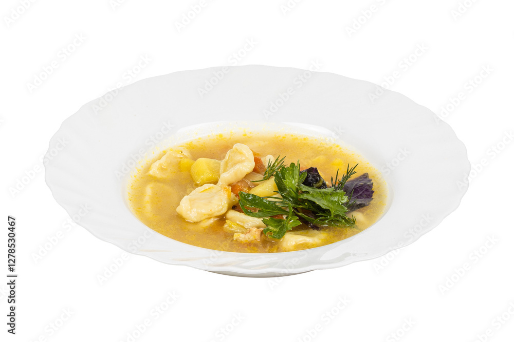 A bowl of meatball soup with vegetables on a white background A bowl of meatball soup with vegetables on a white background