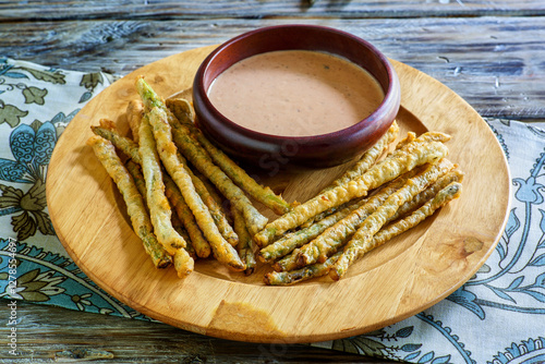 Bilde på lerret asparagus fritter sticks with a spicy dipping sauce