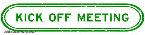 Grunge green kick off meeting word rubber seal stamp on white background