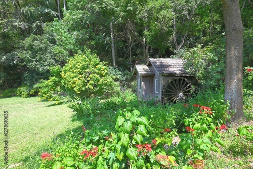 Rustic Wooden Watermill Cottage in a Lush Garden
