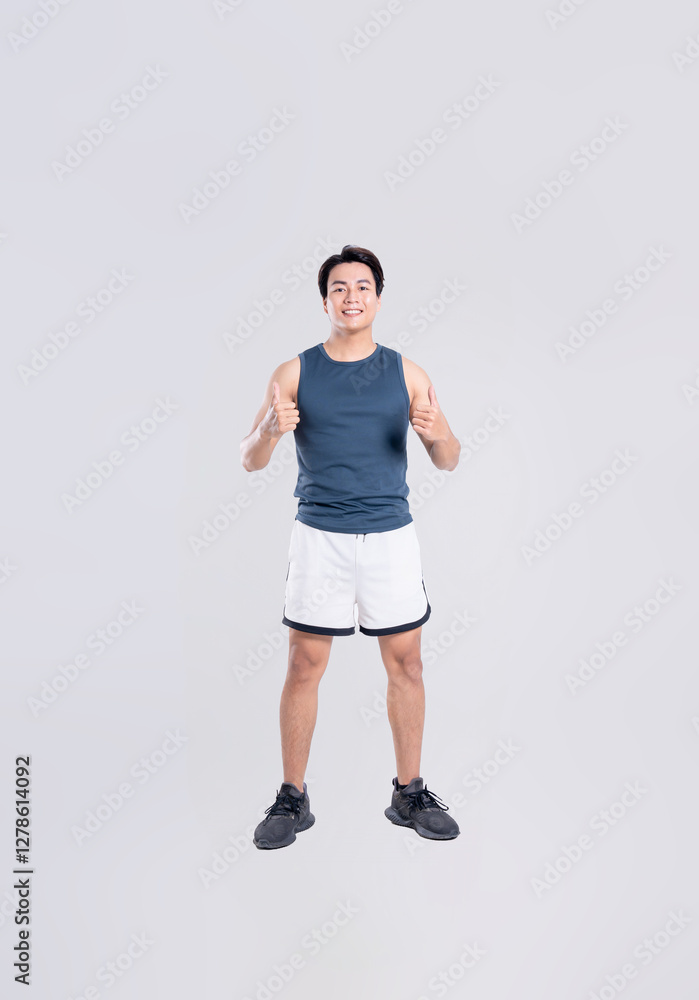 Portrait of healthy Asian man exercising on white background Portrait of healthy Asian man exercising on white background