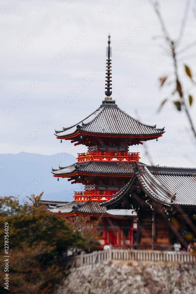 Naklejka premium Kiyomizu-dera buddhist temple in Kyoto prefecture, Japan, Higashiyama ward, autumn fall view with mountains, Kyoto streets and skyline, shrine and pagoda, travel to Japan, Kansai region
