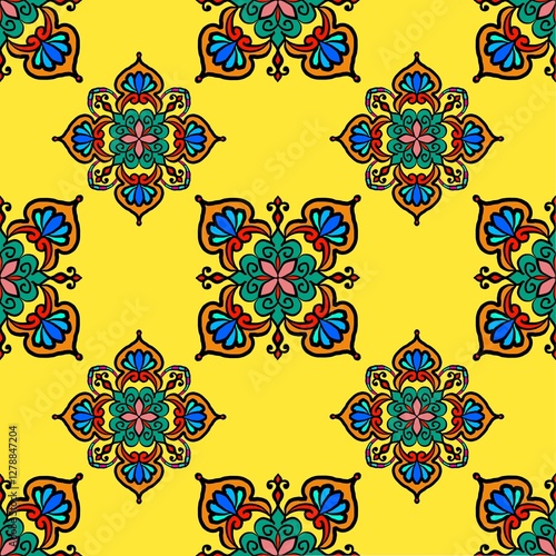 A vibrant yellow patterned design featuring intricate floral motifs in blue, green, and red, creating a lively and decorative appearance.