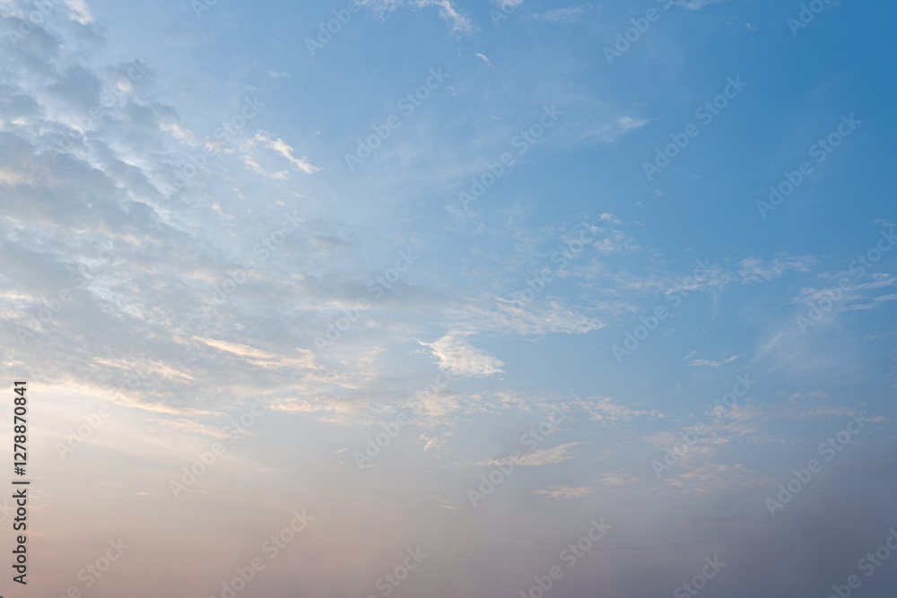 Serene Sunrise Sky Pastel Hues and Wispy Cloudscape Panorama Serene Sunrise Sky Pastel Hues and Wispy Cloudscape Panorama