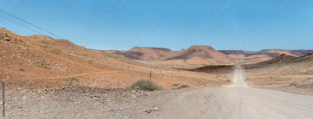 C39 dirt road uphill and downhill in desert, near Bergsig, Namibia
