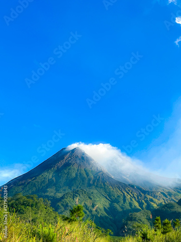 beautiful view of mount merapi against blue sky and white cloud