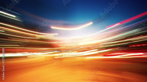 Timelapse flickering light trails. Blurry colorful city streak lights glowing at night, long exposure rotating camera bright multicolored street illumination. Curved lines change with strobe effect