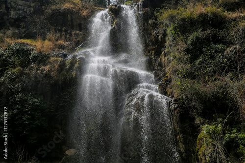 View of a beautiful waterfall in a mountain valley, Close waterfall rocks, Water show supported by rocks, Mountain waterfall, waterfall in the forest, Swat, KPK Province, Pakistan 
