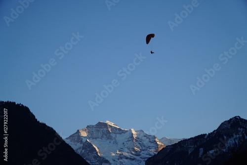 paraglider over the mountains