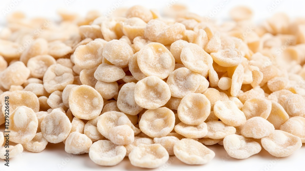 Pile of Small White Handmade Orechiette Pasta on a White Background Pile of Small White Handmade Orechiette Pasta on a White Background