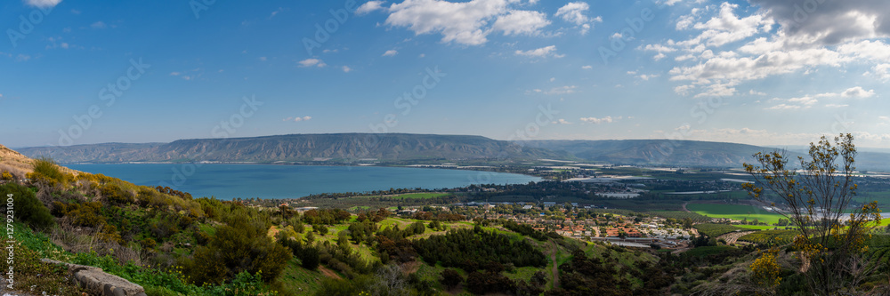 Panoramic view of the Sea of Galilee from the viewpoint along the road down from Poriya in Israel. Panoramic view of the Sea of Galilee from the viewpoint along the road down from Poriya in Israel.