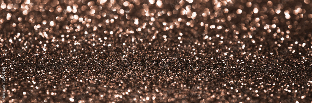 Mocha Mousse, brown sparkling glitter bokeh background banner, abstract defocused texture header. Holiday lights. Demonstrating color, trend 2025 year. Mocha Mousse, brown sparkling glitter bokeh background banner, abstract defocused texture header. Holiday lights. Demonstrating color, trend 2025 year.