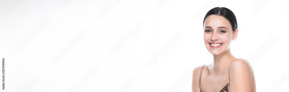 Banner with beauty portrait of young beautiful smiling woman against white background.