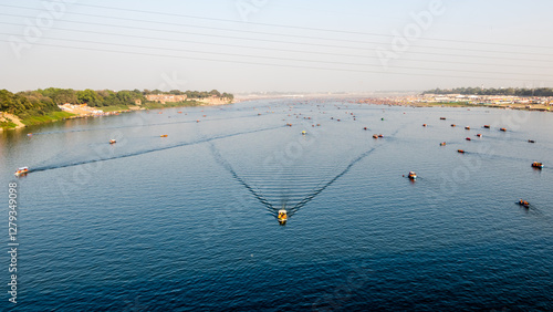 Aerial view of sangam at The Maha Kumbh Mela in Prayagraj, Uttar Pradesh at the Triveni Sangam in Prayagraj, Uttar Pradesh, India. The Mahakumbh Mela is a Hindu festival that happens every 12 years.