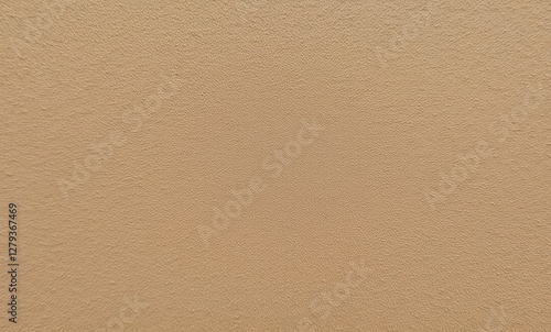 Textured sandy beige wall surface.