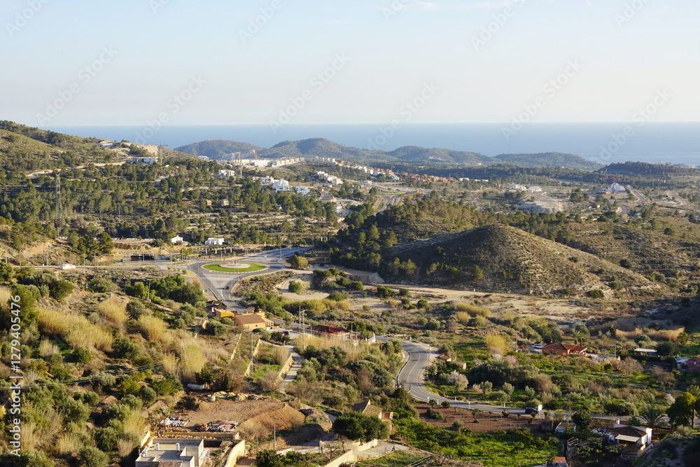 The view from Finestrat village in the direction of Benidorm and seaside, Spain The view from Finestrat village in the direction of Benidorm and seaside, Spain