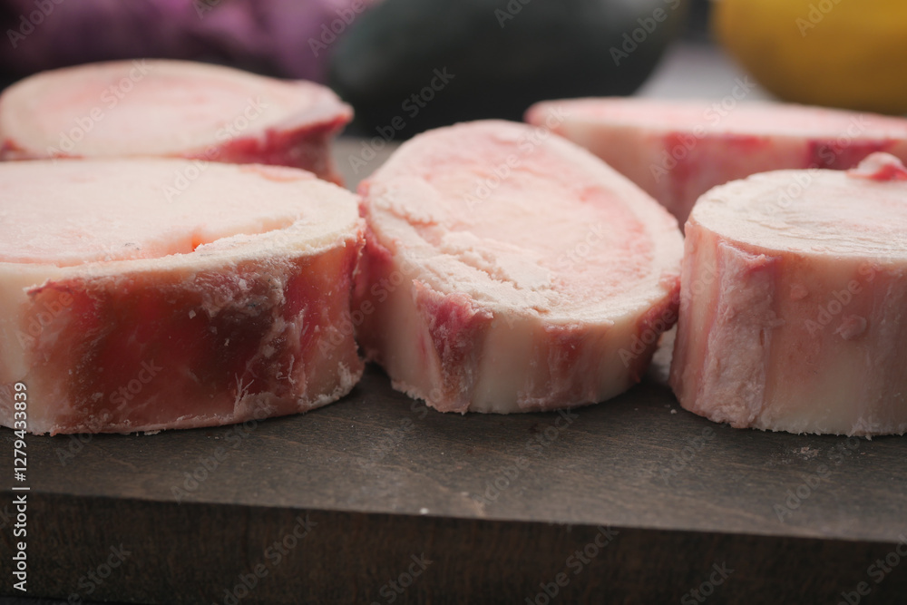 Freshly cut marrow bones ready for cooking at a rustic kitchen Freshly cut marrow bones ready for cooking at a rustic kitchen