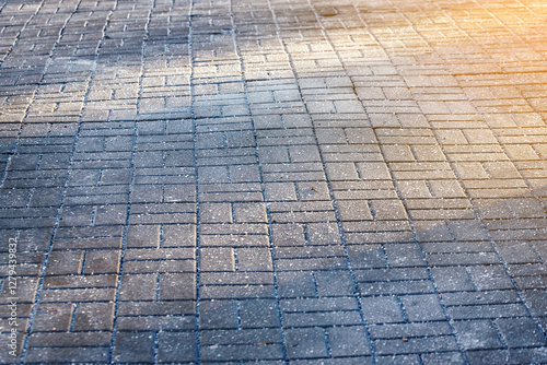 Obraz na płótnie Harmful effects of salt on pavement slabs, environmental risks, long-term damage during winter maintenance. Salt harms pets and wildlife, pollutes drinking water, and corrodes buildings, cars, bridges w salonie