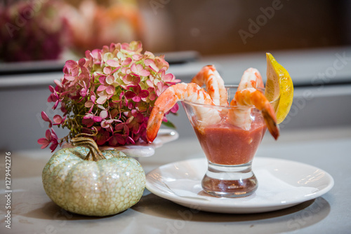 shrimp cocktail pumpkin flowers set up for a fall wedding 