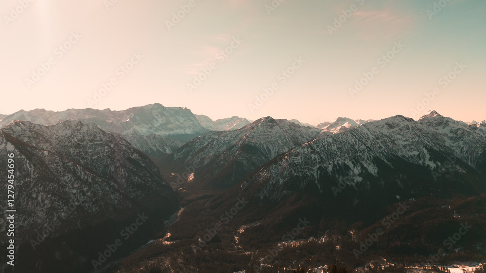 Fototapeta premium Snowy mountains in Bavaria during sunset