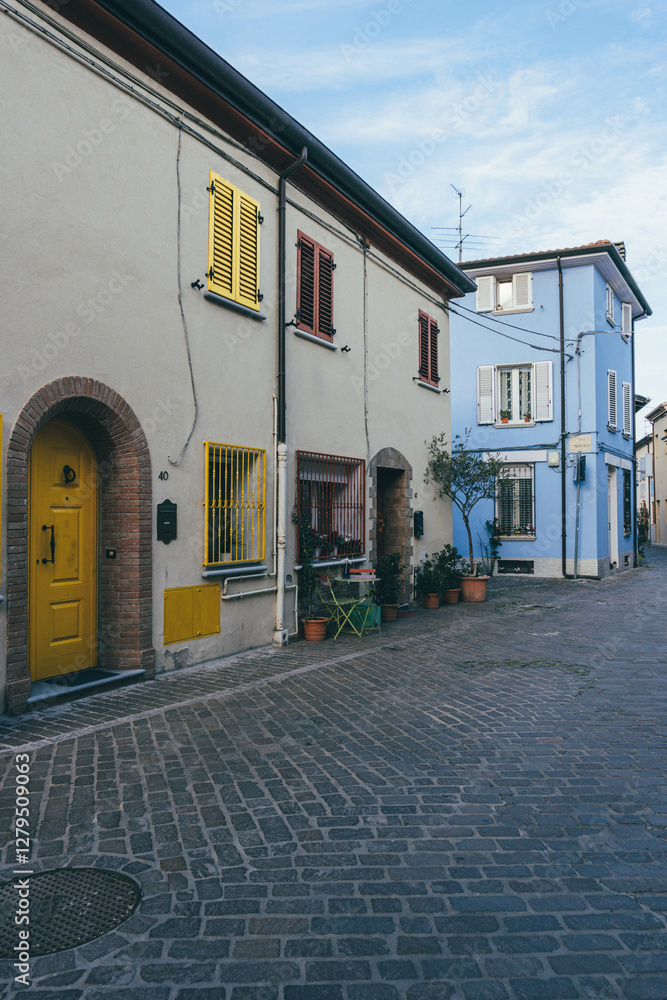 Fototapeta premium street of italian colorful houses in rimini by the sea pedestrian 