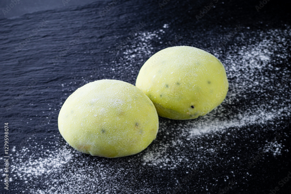 Mochi Green Japanese dessert on a black background
