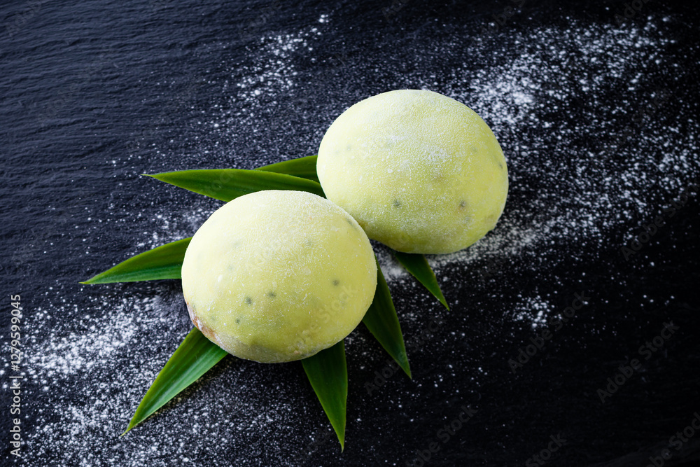 Mochi Green Japanese dessert on a black background