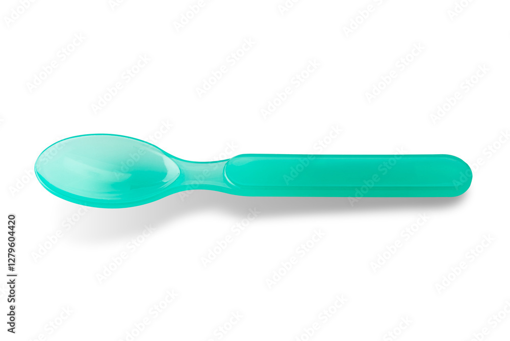 Baby plastic spoon, green small spoon for children isolated Baby plastic spoon, green small spoon for children isolated