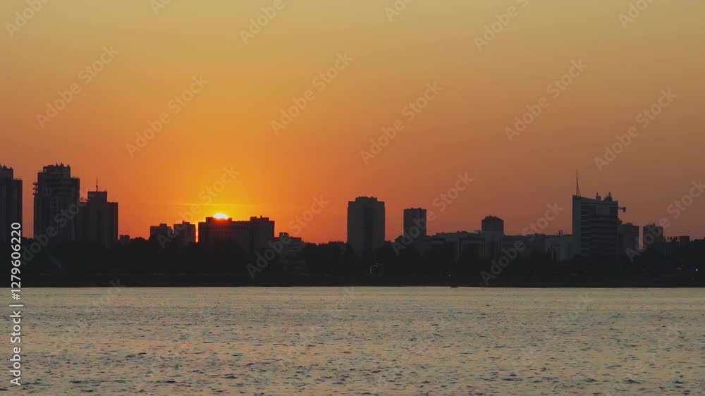 Experience the stunning beauty of a sunset reflecting over a vibrant urban skyline. Media Experience the stunning beauty of a sunset reflecting over a vibrant urban skyline. Media