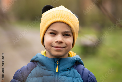 Obraz na płótnie Portrait of little adorable boy walking in park w salonie