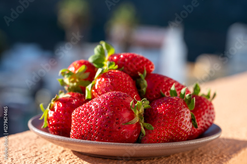 New harvest, plate with bio ripe red sweet strawberry from Tenerife, Canary islands, Spain, vegetarian food local grown fruits
