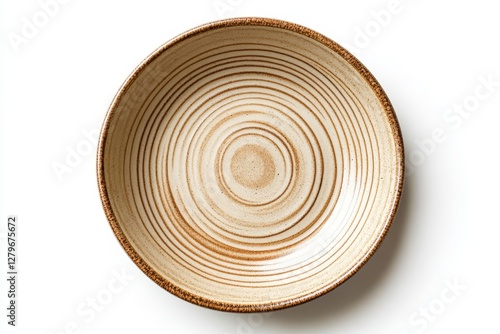 Handcrafted beige ceramic dish with sandy texture top view on white background