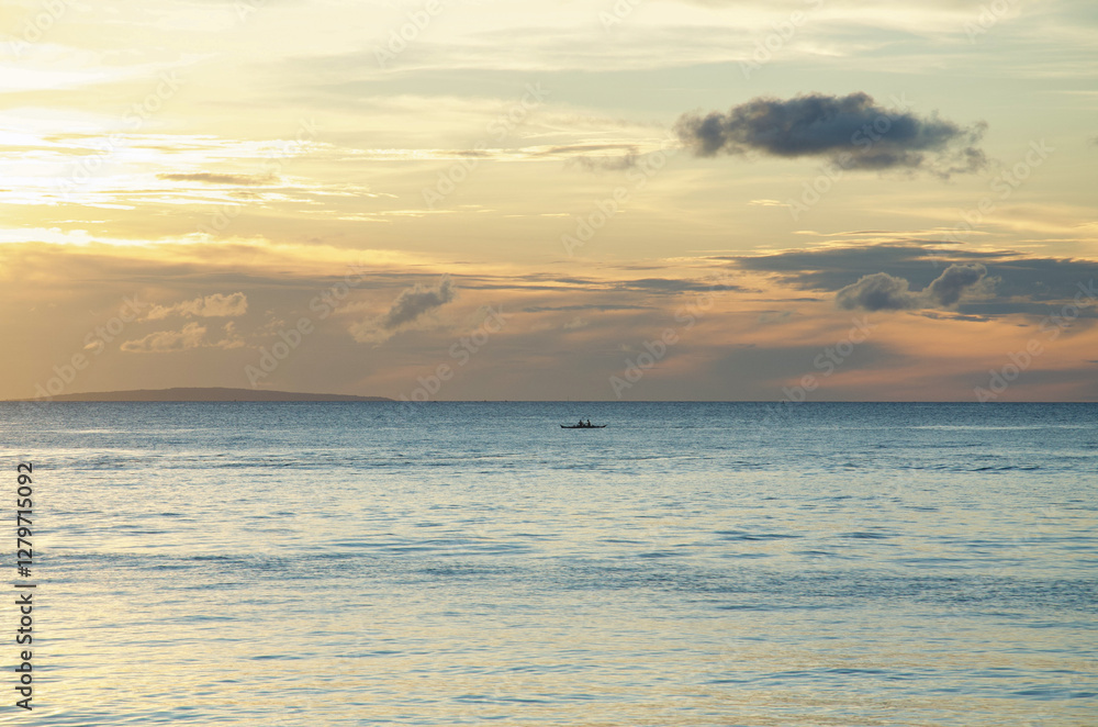 A tranquil seascape at Boracay Island, with a lone boat on calm waters under a dramatic sky, capturing the serene beauty of the horizon and the golden hues of sunset. A tranquil seascape at Boracay Island, with a lone boat on calm waters under a dramatic sky, capturing the serene beauty of the horizon and the golden hues of sunset.