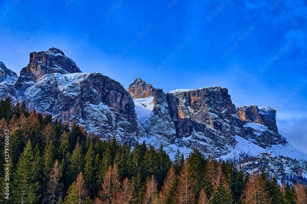 Beautiful panoramic view to the Sellaronda - the ski circuit around the Sella group in Dolomites, Italy - Badia, Gherdeina, Fascia. Extraordinary snowy peaks of the dolomites, southern Alps.