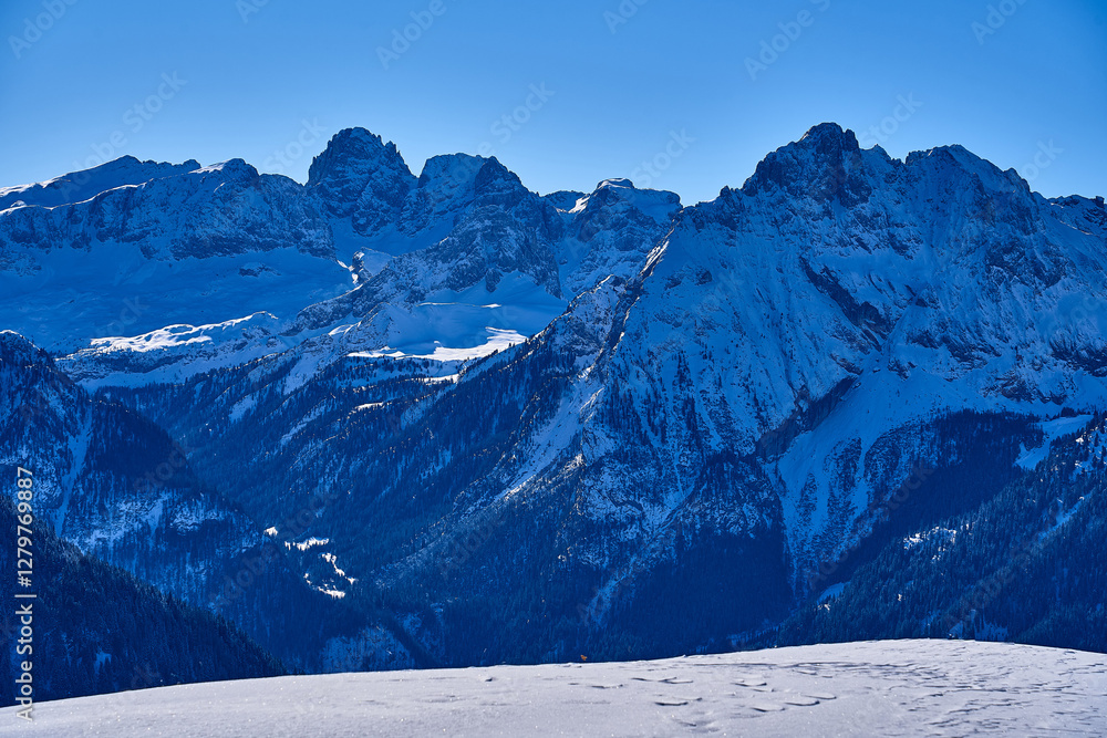 Beautiful panoramic view to the Sellaronda - the ski circuit around the Sella group in Dolomites, Italy - Badia, Gherdeina, Fascia. Extraordinary snowy peaks of the dolomites, southern Alps.