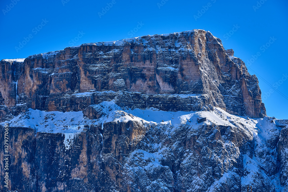 Beautiful panoramic view to the Sellaronda - the ski circuit around the Sella group in Dolomites, Italy - Badia, Gherdeina, Fascia. Extraordinary snowy peaks of the dolomites, southern Alps.