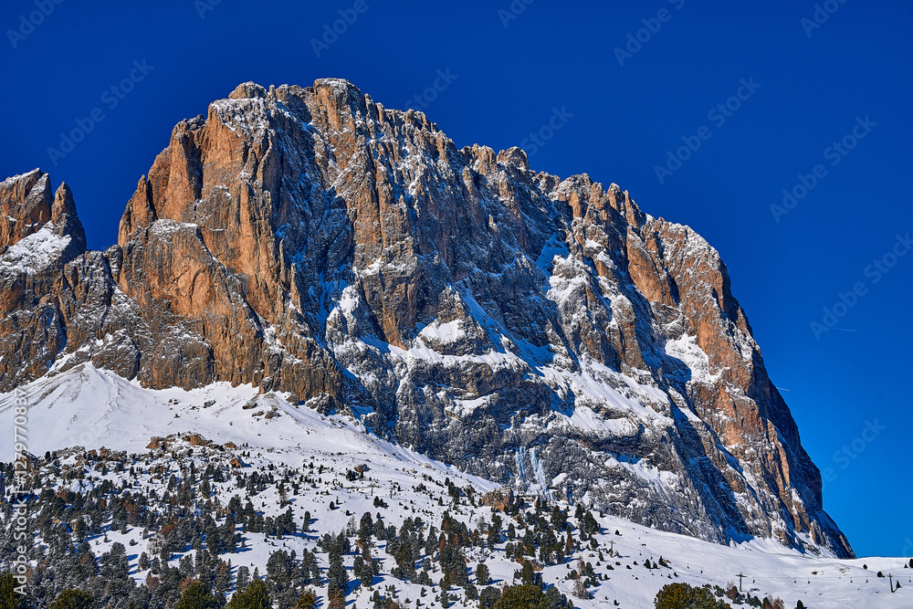 Beautiful panoramic view to the Sellaronda - the ski circuit around the Sella group in Dolomites, Italy - Badia, Gherdeina, Fascia. Extraordinary snowy peaks of the dolomites, southern Alps.