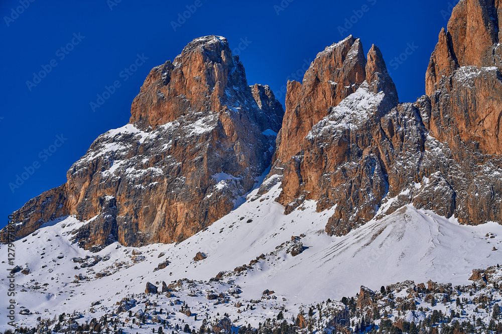 Beautiful panoramic view to the Sellaronda - the ski circuit around the Sella group in Dolomites, Italy - Badia, Gherdeina, Fascia. Extraordinary snowy peaks of the dolomites, southern Alps.