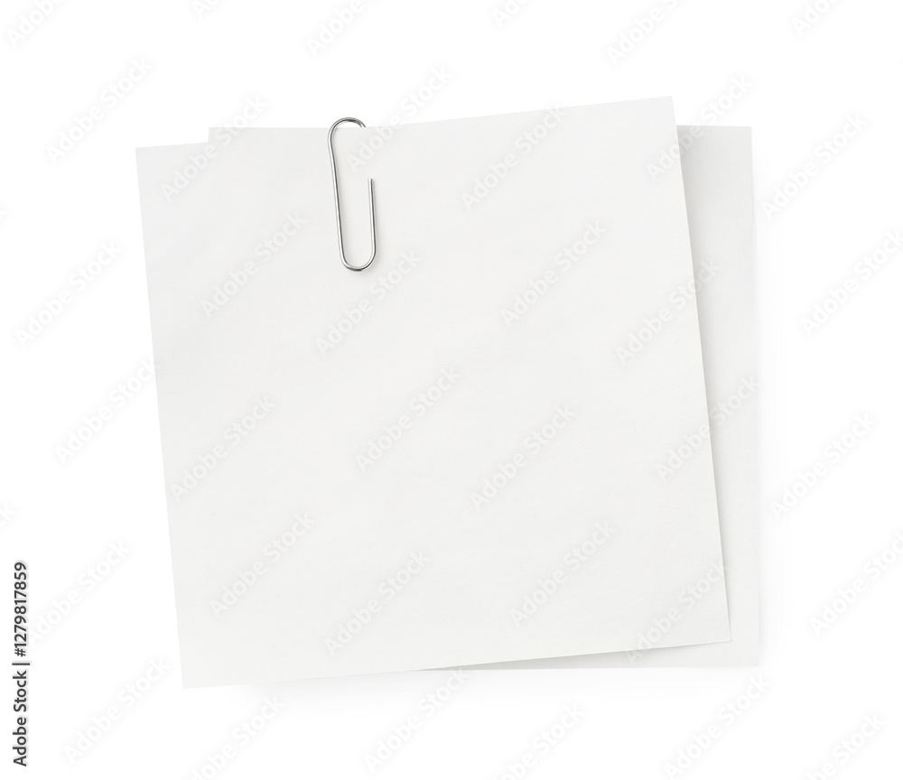 Blank paper notes attached with metal clip isolated on white, top view Blank paper notes attached with metal clip isolated on white, top view