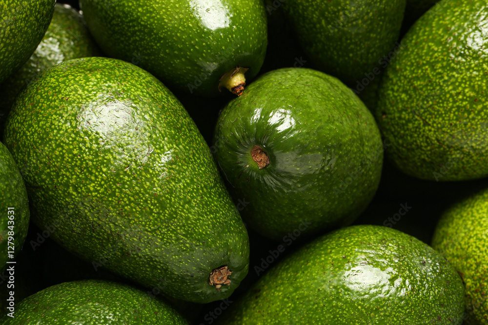 Texture of fresh ripe avocados as background, closeup Texture of fresh ripe avocados as background, closeup