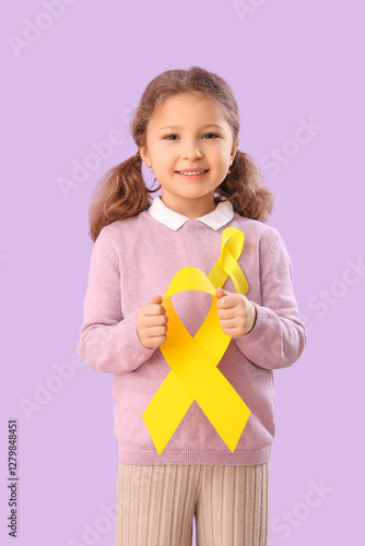 Cute little girl with yello...