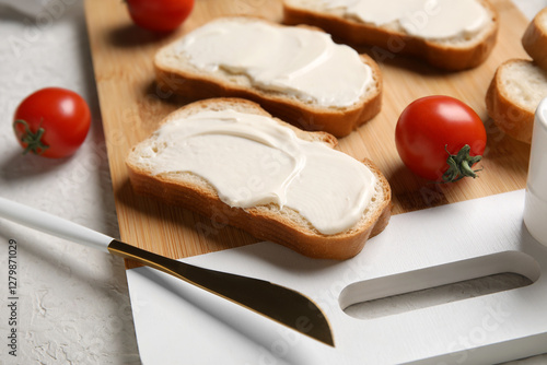Cream cheese spreading on t...