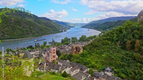 High angle view over the medieval town of Bacharach and the picturesque rhine river valley on a summer day, parallax tracking movement, Germany