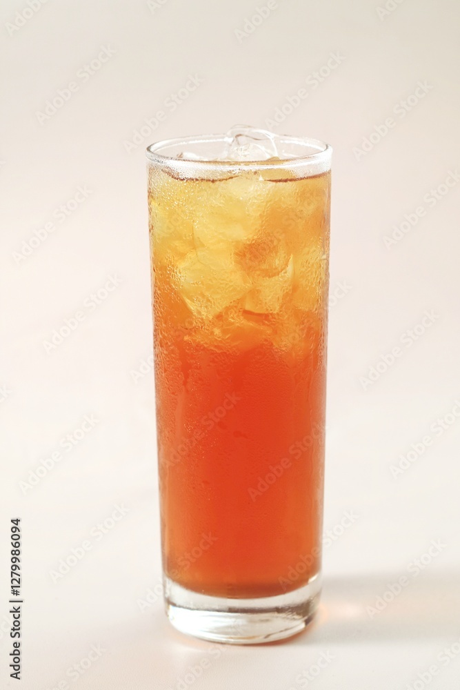 a glass of ice tea isolated on white background
a glass of ice tea isolated on white background